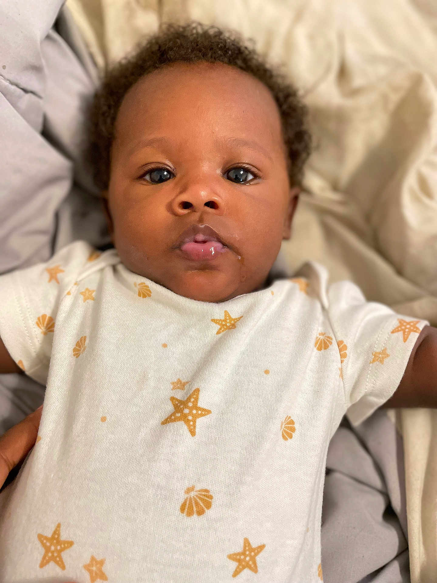 Marlia is registered to the contest to win money with this photo: baby, babylaughing, blonde, clothing, face, frown, hair, happy, head, newborn, person, photography, portrait, sad, skin, sleeve, smile, spitting, yawning