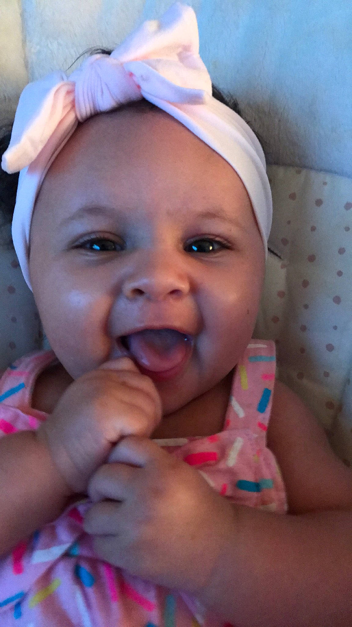 Danica joined the competition — help win amazing prizes! baby, cheek, child, chin, eye, eyebrow, face, facial_expression, forehead, fun, happy, head, headgear, headwear, lip, mouth, nose, person, pink, skin