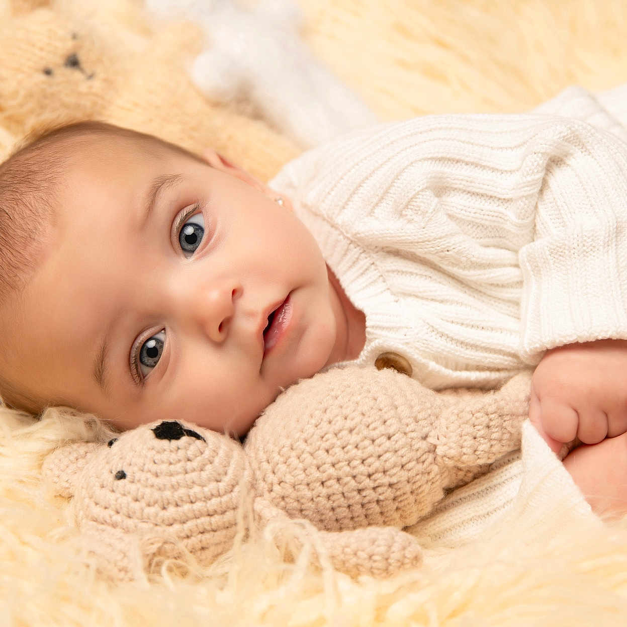 Santana Williams joined the competition — help win amazing prizes! baby, beanie, blanket, bodypart, bonnet, cap, clothing, face, finger, hand, happy, hat, head, knitwear, newborn, person, photography, portrait, smile, sweater