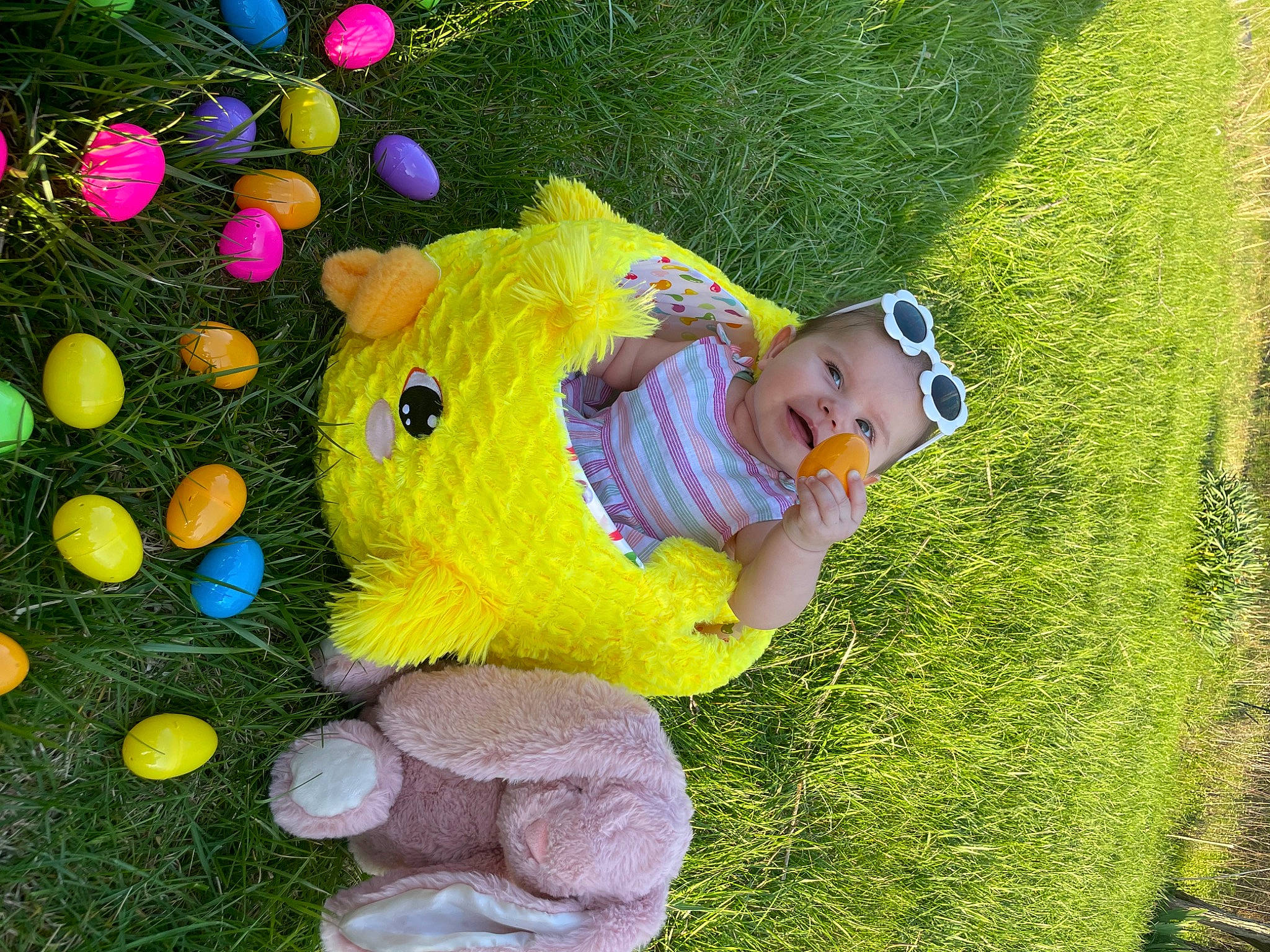 Gabriella is registered to the contest to win money with this photo: baby, baby_toddler_clothing, fun, garden, grass, grass_family, green, groundcover, happy, hedge, lawn, lawn_ornament, leisure, people_in_nature, person, plant, recreation, shrub, textile, toddler