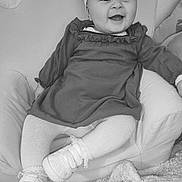 Ruby participe au concours pour gagner de l'argent avec cette photo : baby, blanket, chair, child, clothing, comfortable, cozy, cute, dress, footwear, happy, headband, indoor, infant, portrait, shoe, sitting, smiling, sock, soft