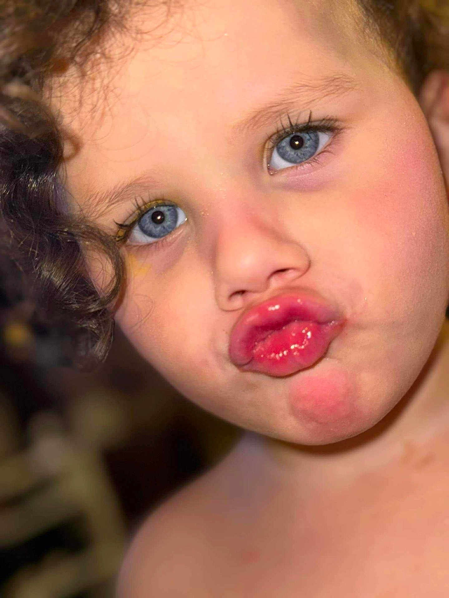 Julionna joined the competition — help win amazing prizes! child, face, blue_eyes, curly_hair, close_up, pouting, lips, skin, expression, portrait, person, cute, funny_face, young, indoors, head, cheek, innocent, childhood, playful