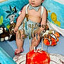 Viaansh a rejoint le concours — aidez-le/la à gagner de superbes lots ! baby, child, birthday, cake, playpen, plush_toys, bow_tie, suspenders, cute, celebration, indoor, infant, smiling, decor, soft_toys, colorful, happy, person, sitting, party