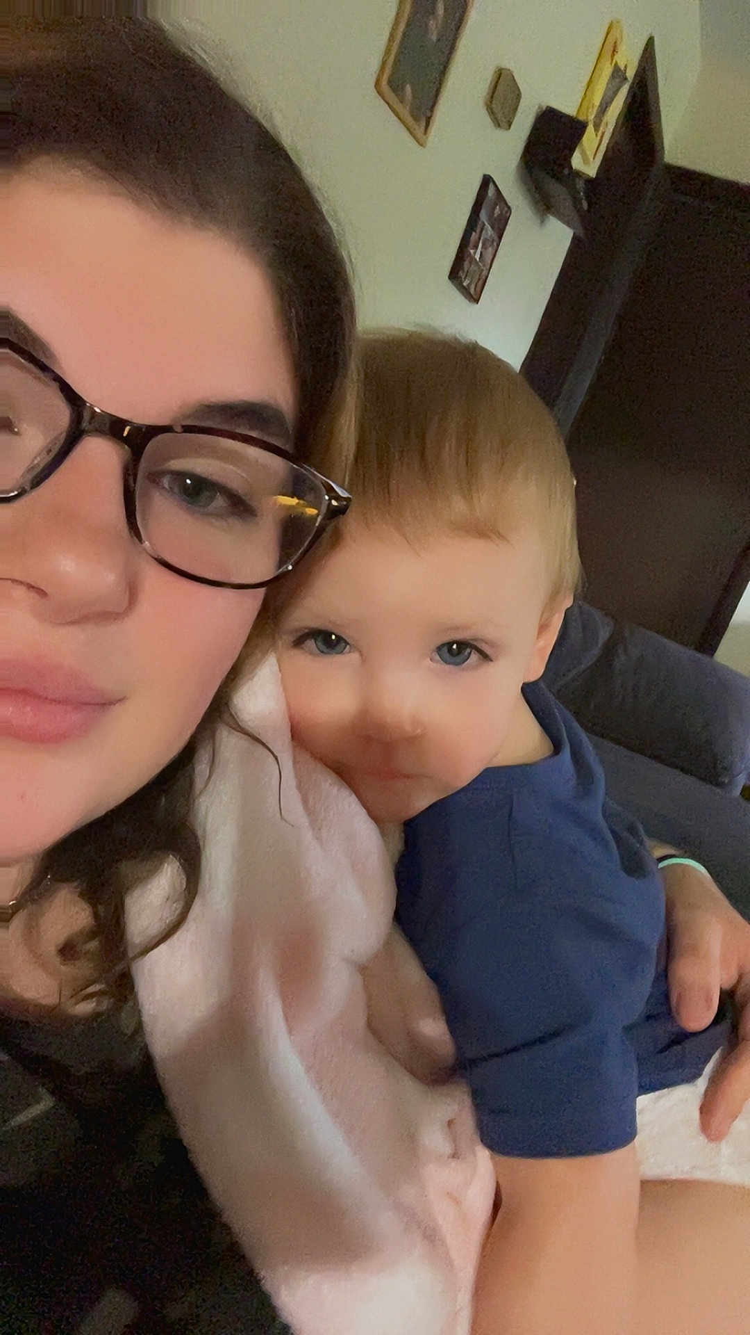 Malachi joined the competition — help win amazing prizes! woman, child, glasses, blanket, indoor, portrait, face, couch, home, person, childhood, cozy, family, casual, blue_shirt, skin, hair, photography, smile, closeup