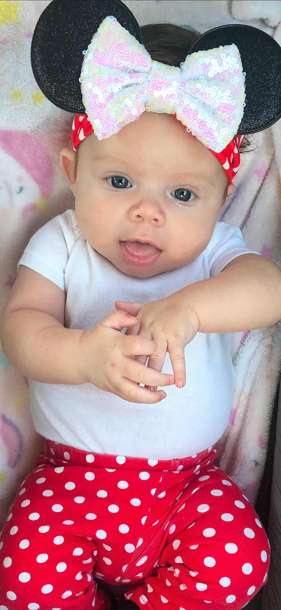 Kenzli is registered to the contest to win money with this photo: baby, baby_toddler_clothing, cap, cheek, child, chin, costume_hat, fun, gesture, hair_accessory, happy, headwear, lip, magenta, pattern, person, pink, skin, sleeve, smile