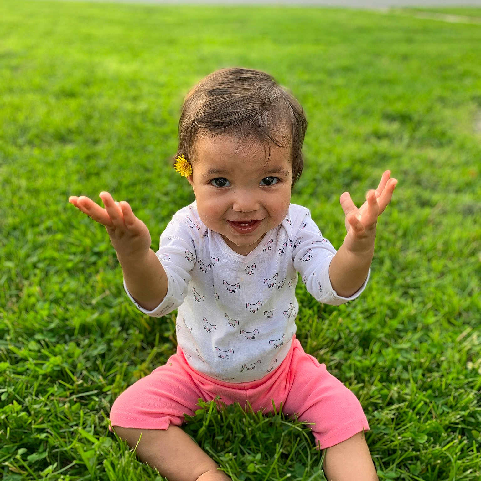 Saraya joined the competition — help win amazing prizes! baby, child, finger, fun, garden, grass, grass_family, green, hand, happy, joy, lawn, leaf, meadow, people, people_in_nature, person, pink, plant, skin