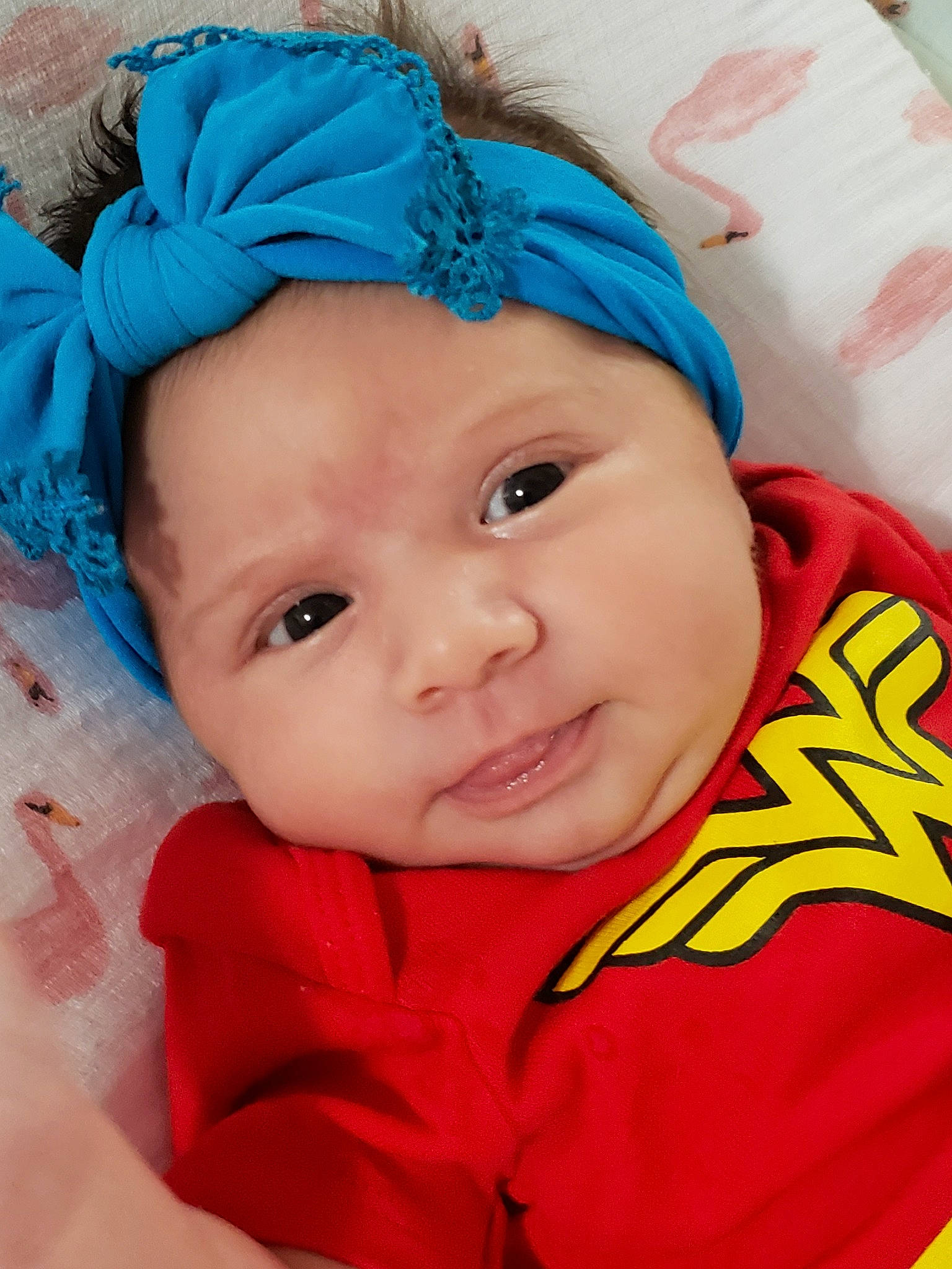 Amy joined the competition — help win amazing prizes! baby, blue, cheek, child, close_up, clothing, eye, face, forehead, hair_accessory, head, headband, headgear, headwear, lip, mouth, nose, person, pink, skin