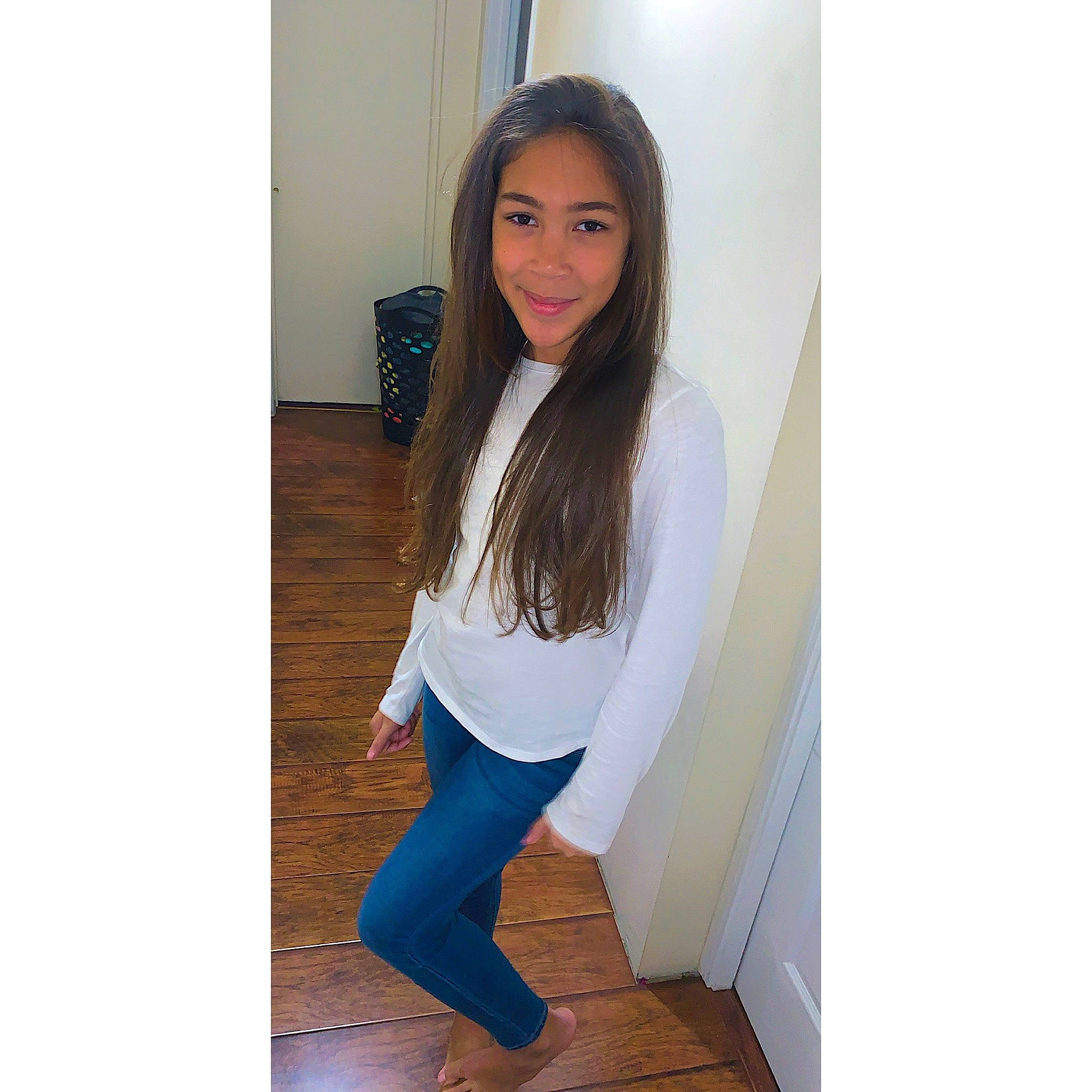 Tianna is registered to the contest to win money with this photo: beauty, beige, black_hair, brown, brown_hair, clothing, denim, footwear, jeans, joy, leg, long_hair, neck, outerwear, person, shoe, shoulder, t_shirt, trousers, turquoise