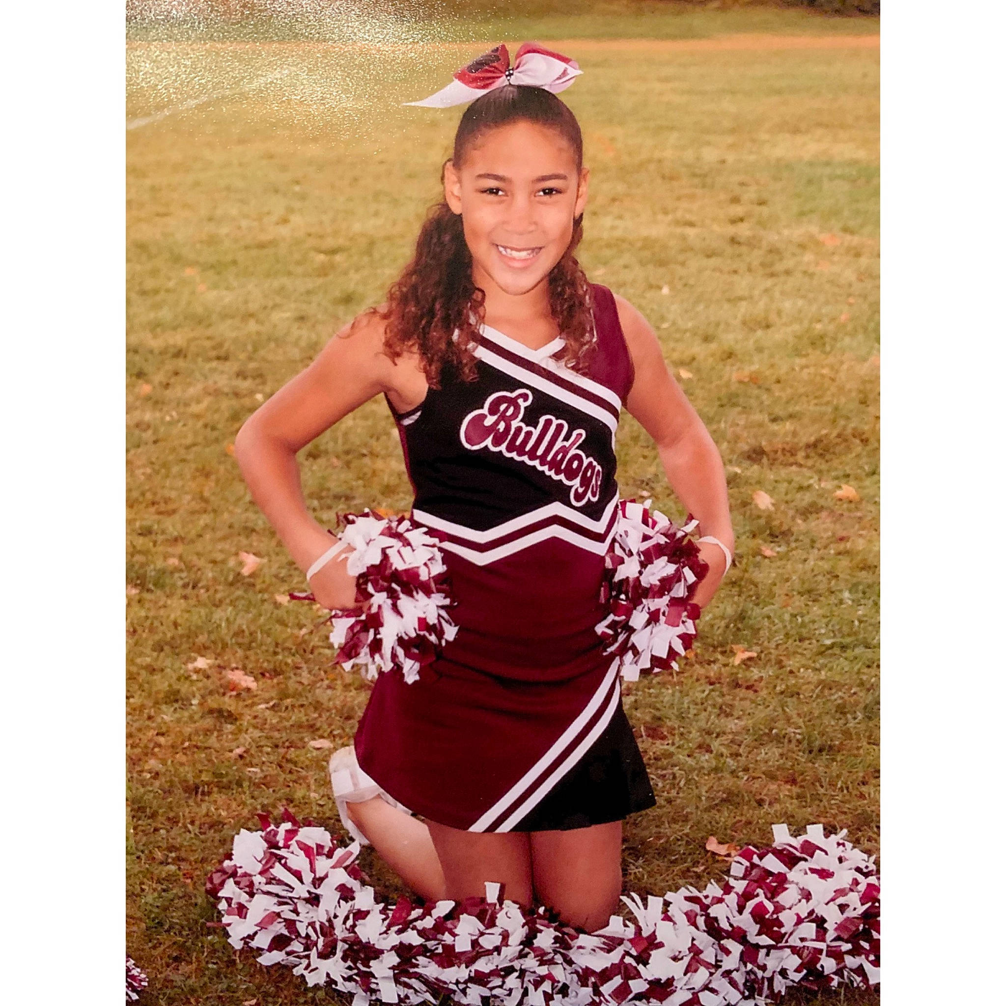 Tianna joined the competition — help win amazing prizes! cheering, cheerleading, cheerleading_uniform, clothing, costume, dress, headgear, joy, majorette_dancer, muscle, person, photo_shoot, product, sports_uniform, style, t_shirt, team, team_sport, uniform