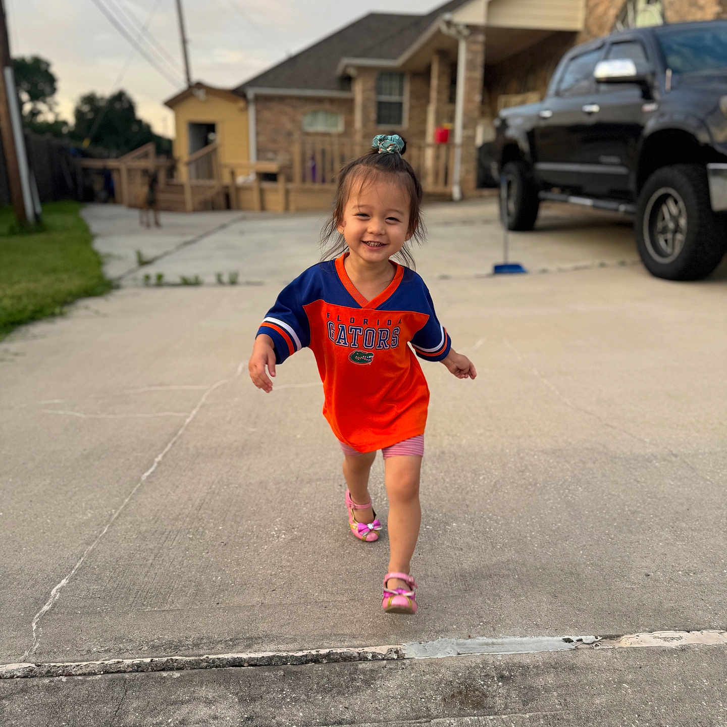 Riley joined the competition — help win amazing prizes! alloywheel, architecture, building, car, carwheel, city, clothing, machine, neighborhood, outdoors, road, shelter, shorts, spoke, street, tire, transportation, urban, vehicle, wheel