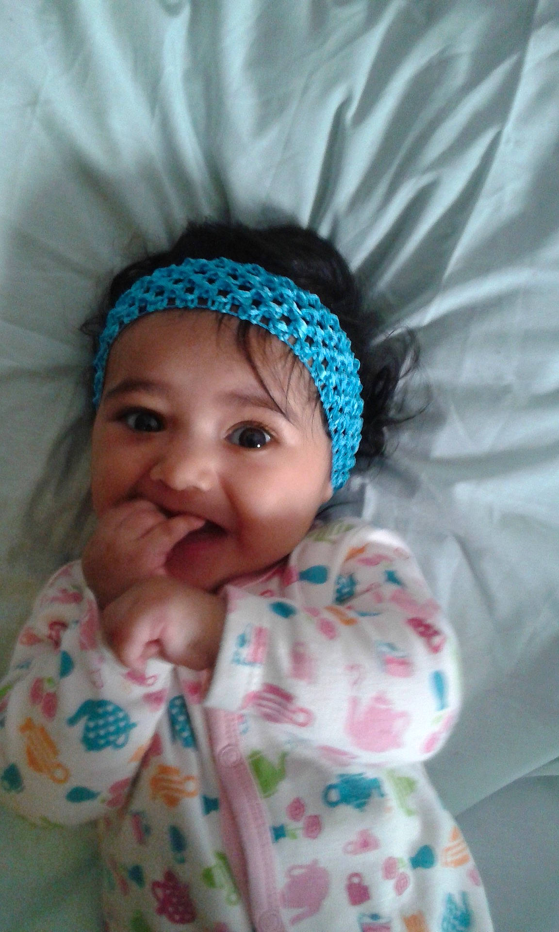 Bibi Raina a rejoint le concours — aidez-le/la à gagner de superbes lots ! beanie, bonnet, cap, cheek, child, crochet, eye, girl, hair_accessory, hat, head, headgear, infant, joy, knit_cap, nose, product, skin, smile, textile