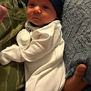 Graeson joined the competition — help win amazing prizes! baby, bear_ears, blanket, blue_hat, camo, child, closeup, cozy, cute, hand, hat, indoors, infant, newborn, onesie, person, portrait, resting, sleepwear, soft_texture