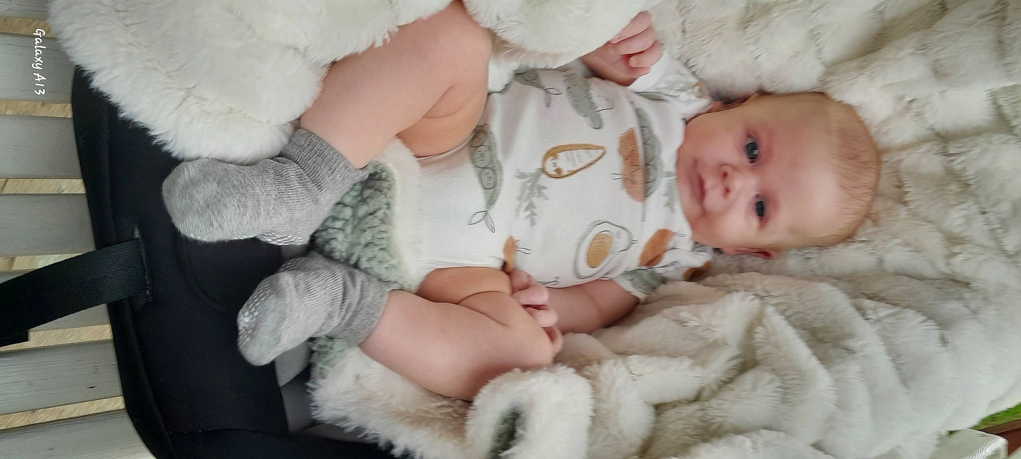 Gunner is registered to the contest to win money with this photo: baby, baby_toddler_clothing, cheek, child, comfort, eye, finger, gesture, happy, headgear, iris, lip, pattern, person, pink, skin, sleeve, textile, thumb, toddler