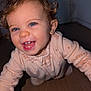 Lily-Rose participe au concours pour gagner de l'argent avec cette photo : baby, blue_eyes, child, close_up, crawling, curly_hair, cute, expression, face, happy, indoor, infant, pajamas, person, portrait, smiling, teeth, toddler, warm_clothing, young_child