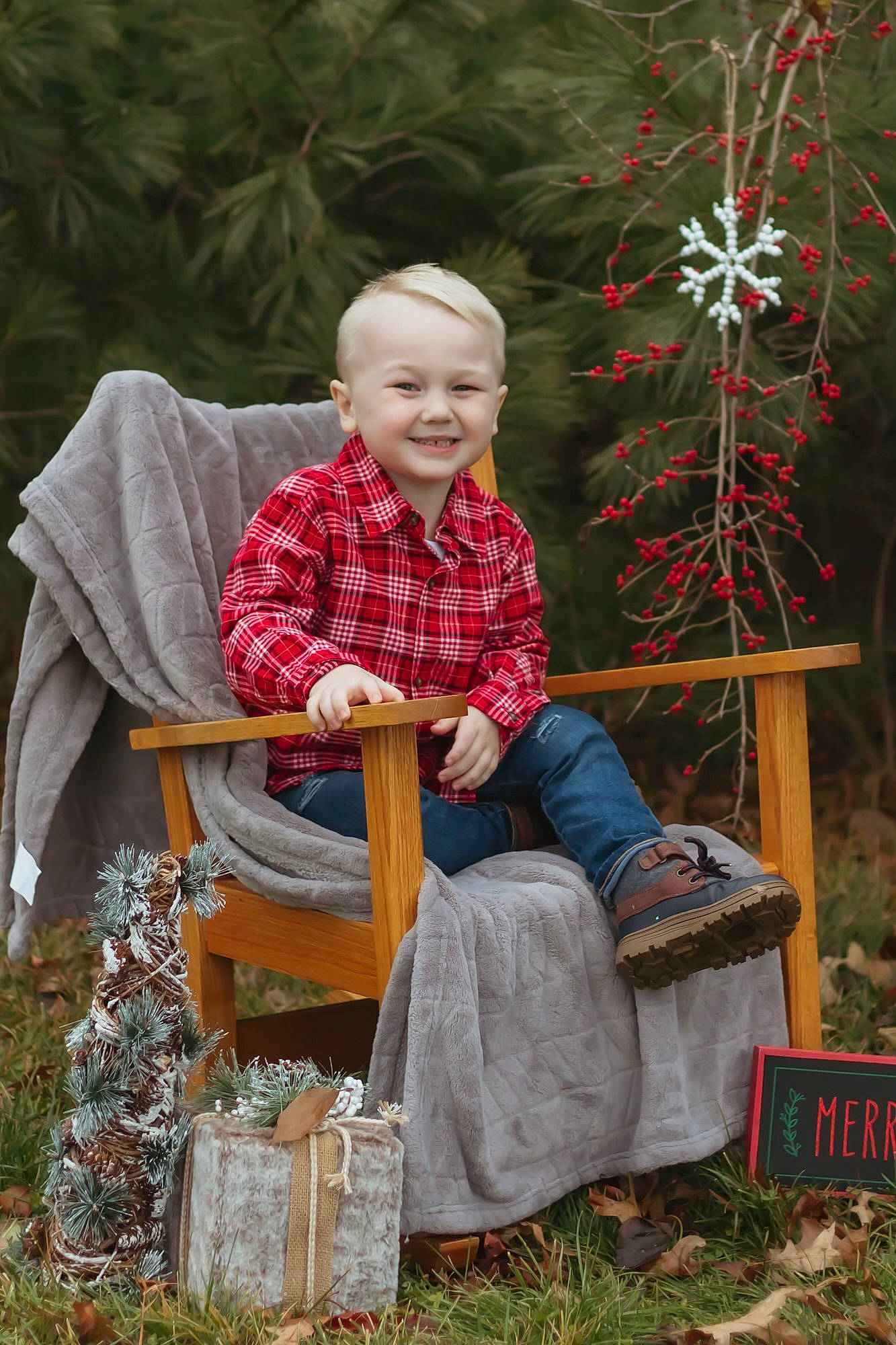 Hayes is registered to the contest to win money with this photo: chair, event, fun, garden, grass, happy, holiday, joy, lap, leaf, leisure, mammal, people_in_nature, person, plant, sitting, smile, toddler, tree, vertebrate