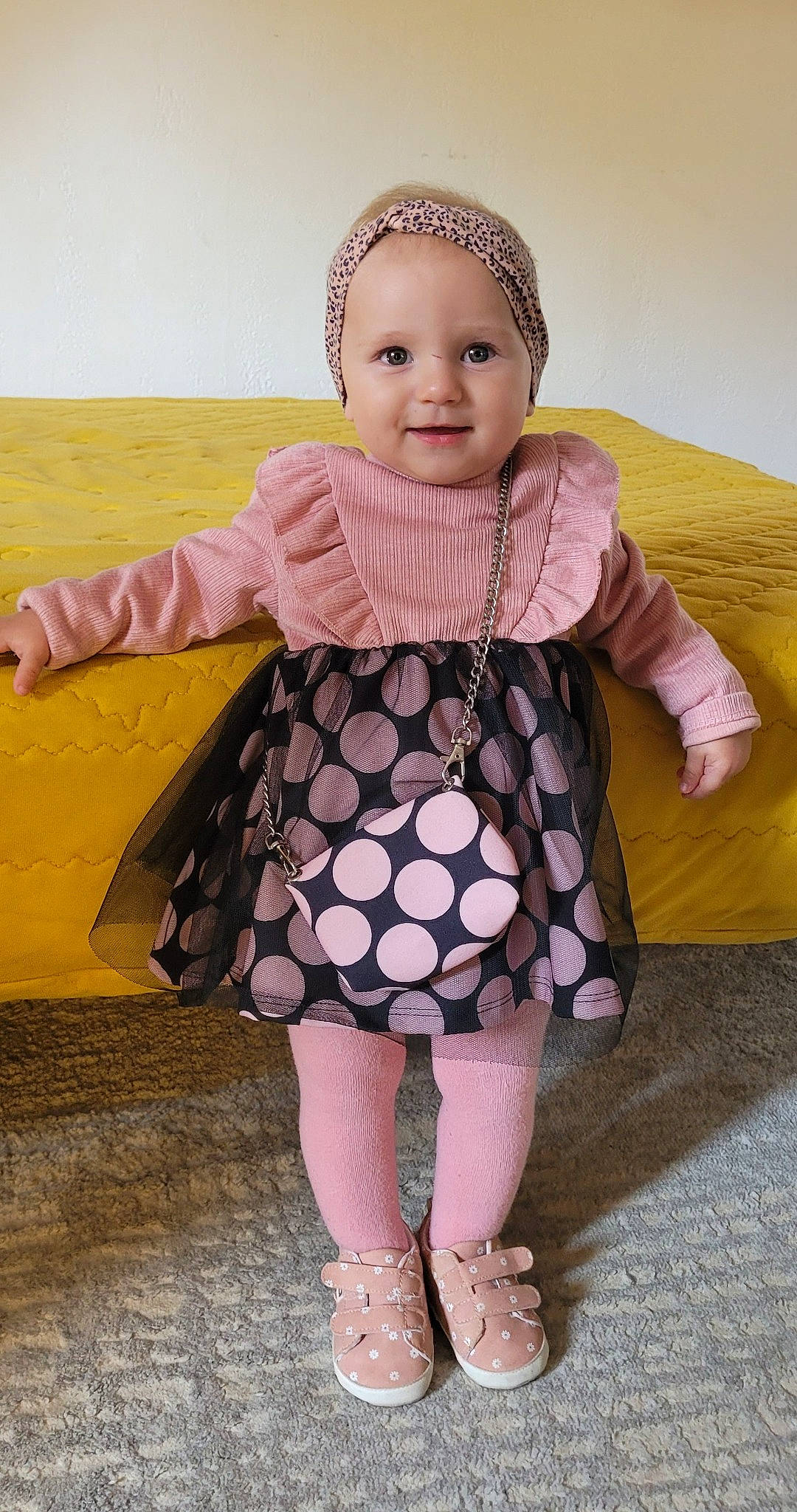 Amelia a rejoint le concours — aidez-le/la à gagner de superbes lots ! baby, baby_toddler_clothing, clothing, dress, eye, face, fun, happy, head, headgear, joy, one_piece_garment, outerwear, person, pink, product, purple, skin, sleeve, smile