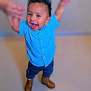 Ricky joined the competition — help win amazing prizes! toddler, child, smiling, happy, blue_shirt, jeans, boots, standing, indoor, hands, playing, cute, portrait, person, hair, fashion, joy, fun, expression, young_kid