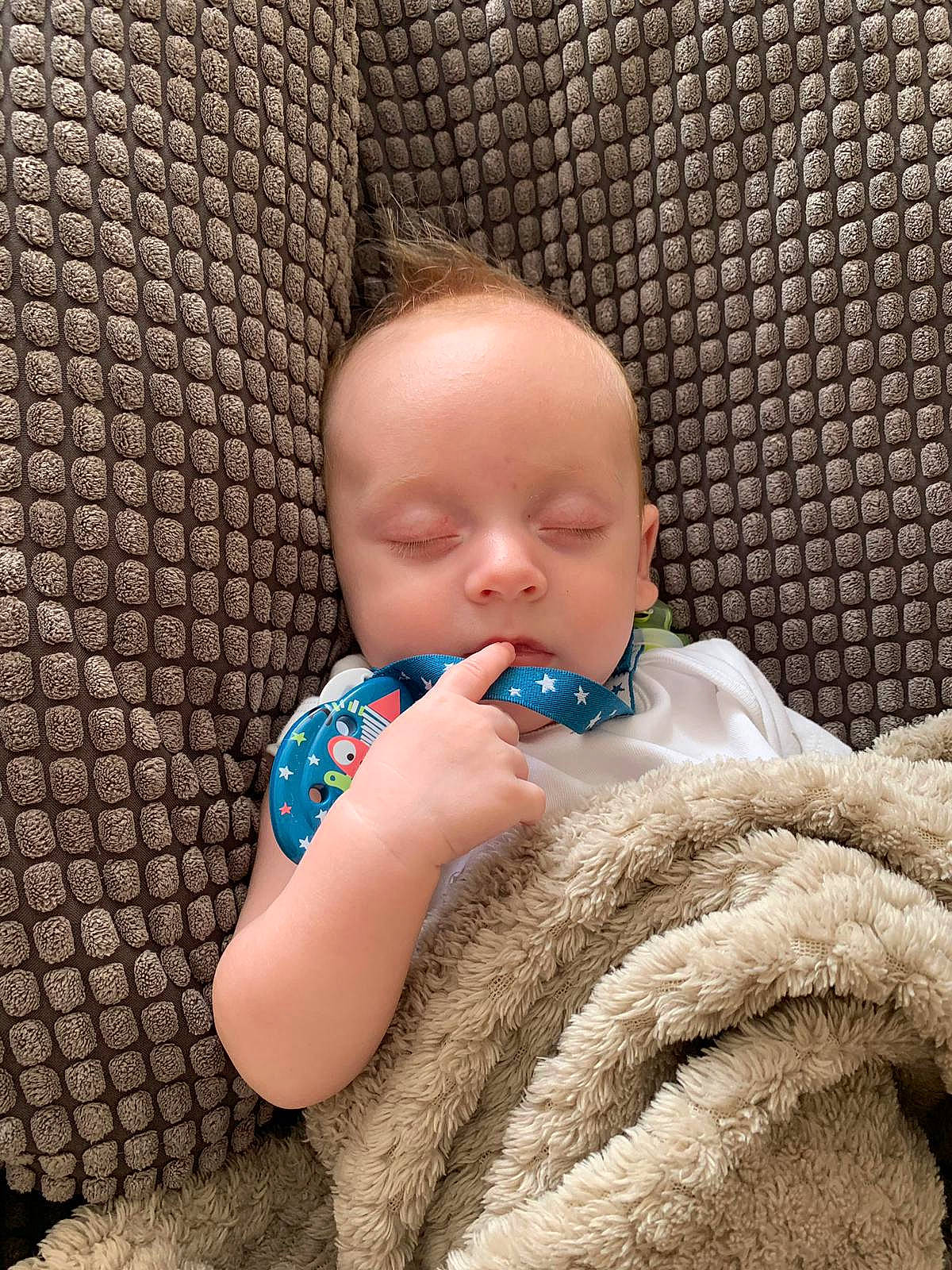 Stan-lee is registered to the contest to win money with this photo: baby, baby_products, cheek, child, finger, nose, person, skin, toddler