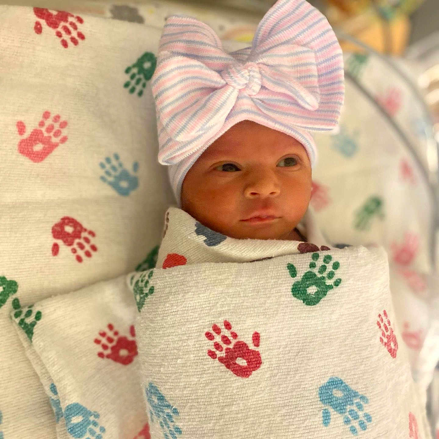 Torianna joined the competition — help win amazing prizes! baby, bed, blanket, bow, child, cozy, cute, cute_baby, face, handprint, hat, hospital, indoors, infant, newborn, portrait, striped, swaddled, wrapped, young