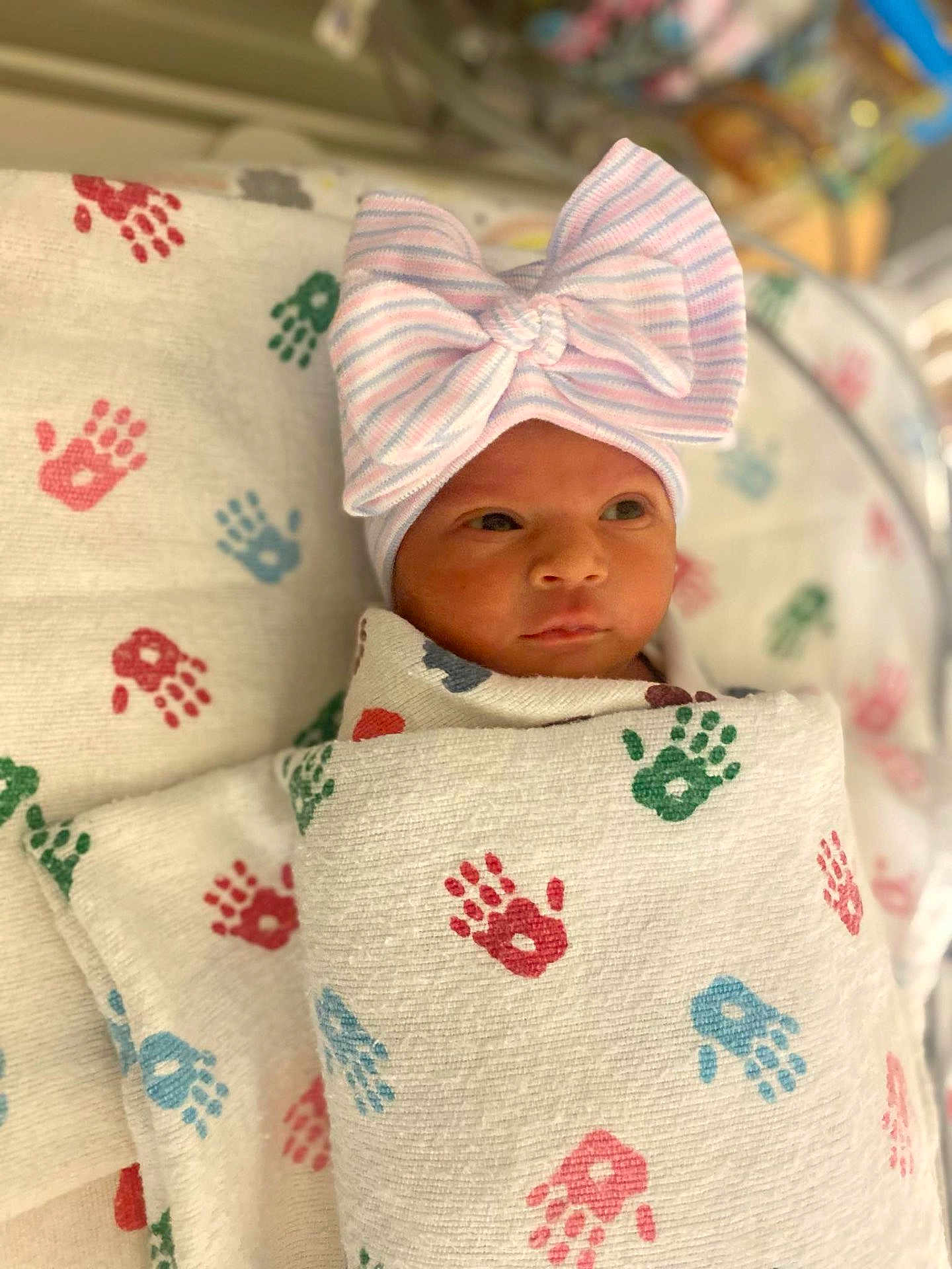 Torianna joined the competition — help win amazing prizes! newborn, baby, infant, swaddled, blanket, hat, bow, striped, handprint, hospital, bed, cozy, cute, face, wrapped, child, young, cute_baby, portrait, indoors