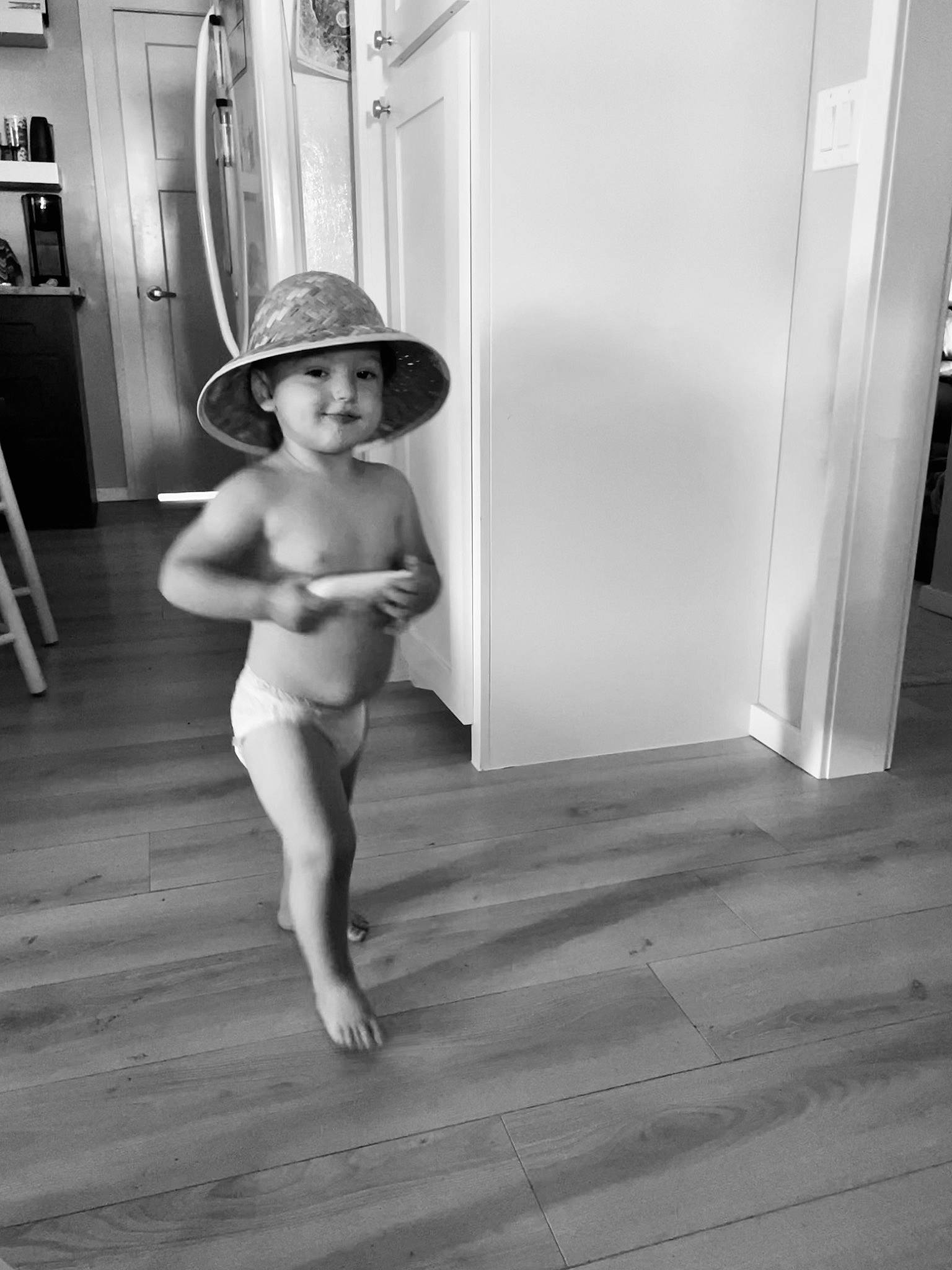 Willie is registered to the contest to win money with this photo: chest, door, elbow, flash_photography, floor, flooring, fun, hardwood, headgear, headwear, human_body, human_leg, knee, leg, monochrome, person, shoulder, style, thigh, trunk