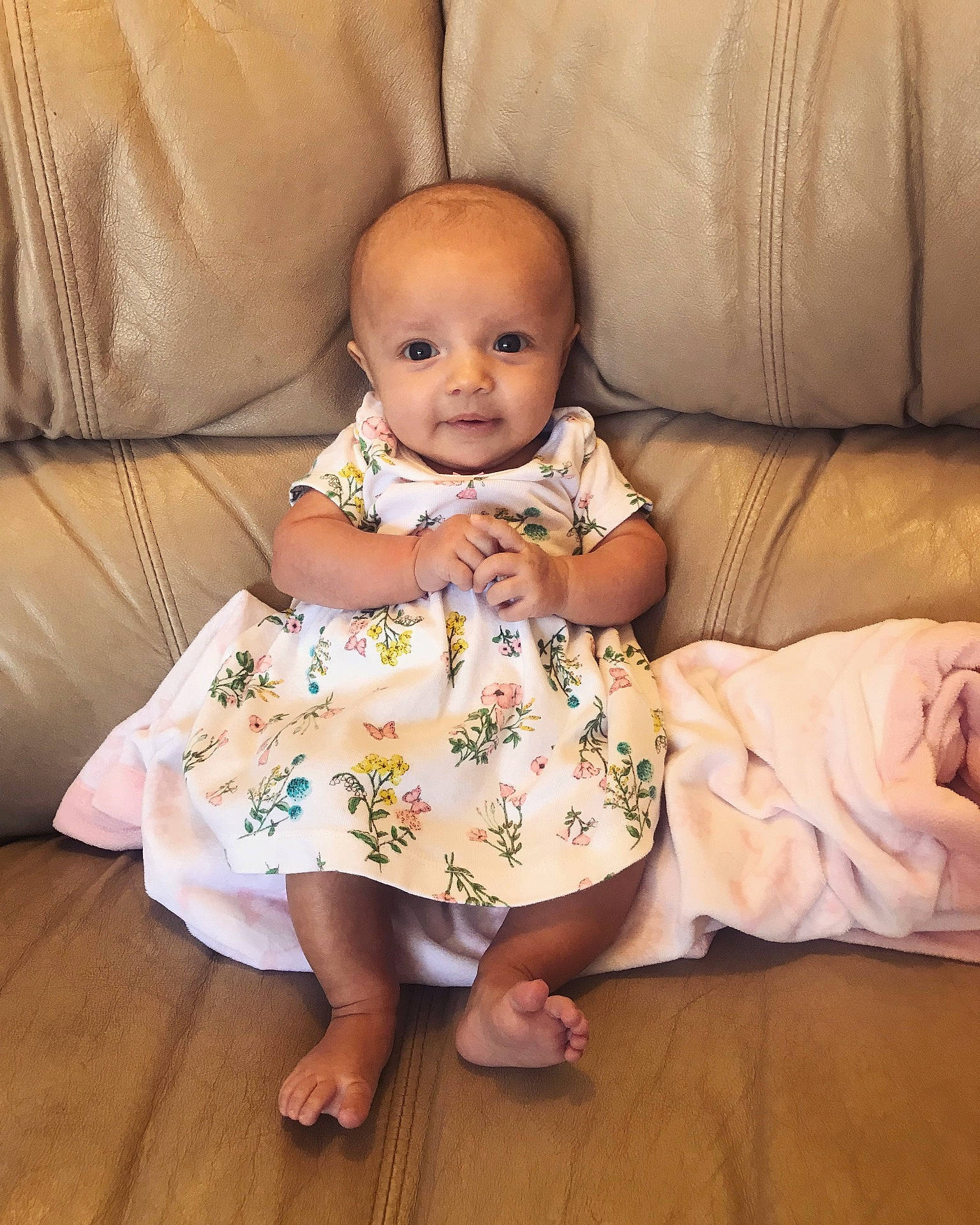 Carla is registered to the contest to win money with this photo: child, girl, infant, iris, person, product, sitting, skin, textile, toddler