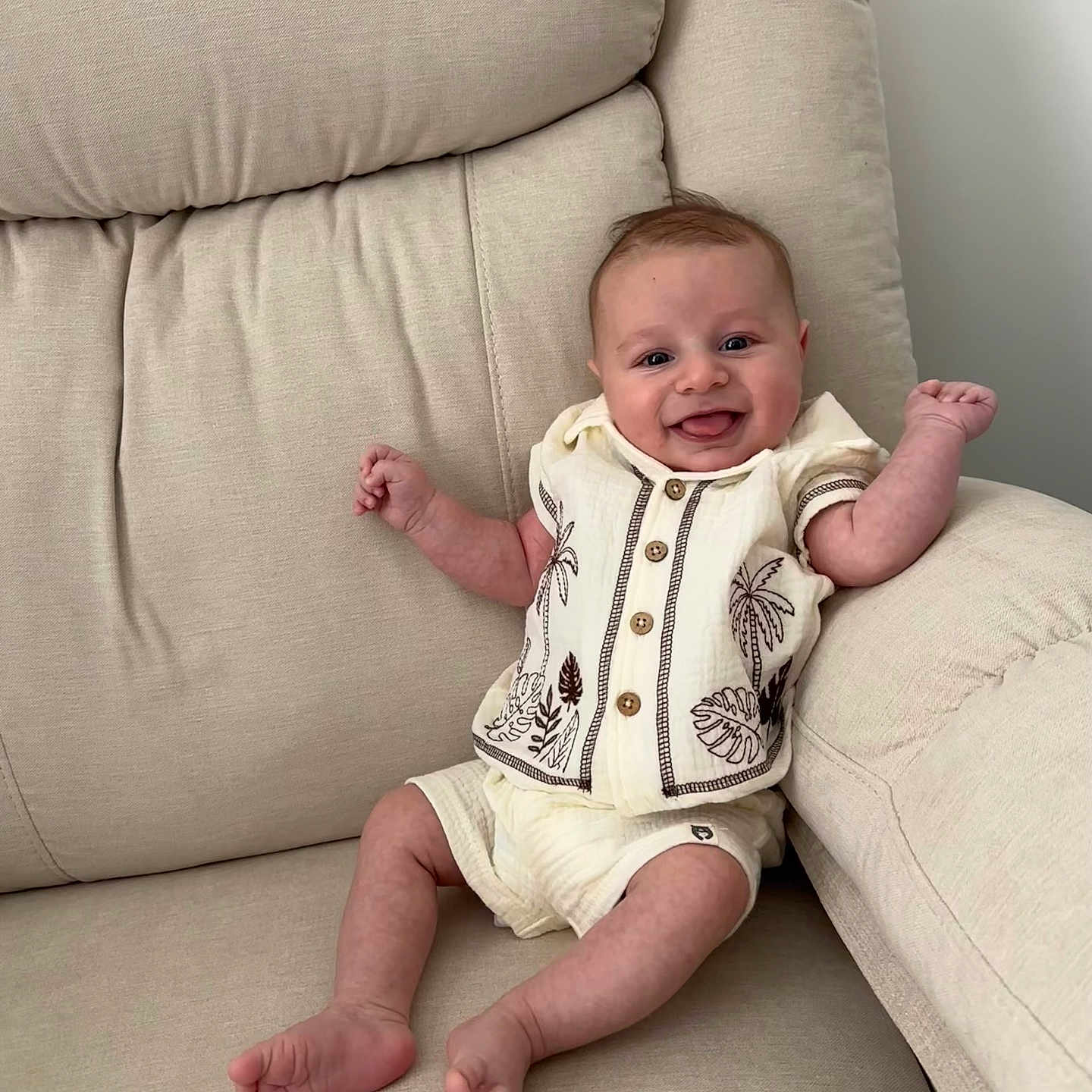 Lirian joined the competition — help win amazing prizes! baby, clothing, comfort, couch, cute, face, foot, furniture, hand, happy, head, indoors, infant, person, raised_hands, shorts, sitting, skin, smile, tropical_pattern