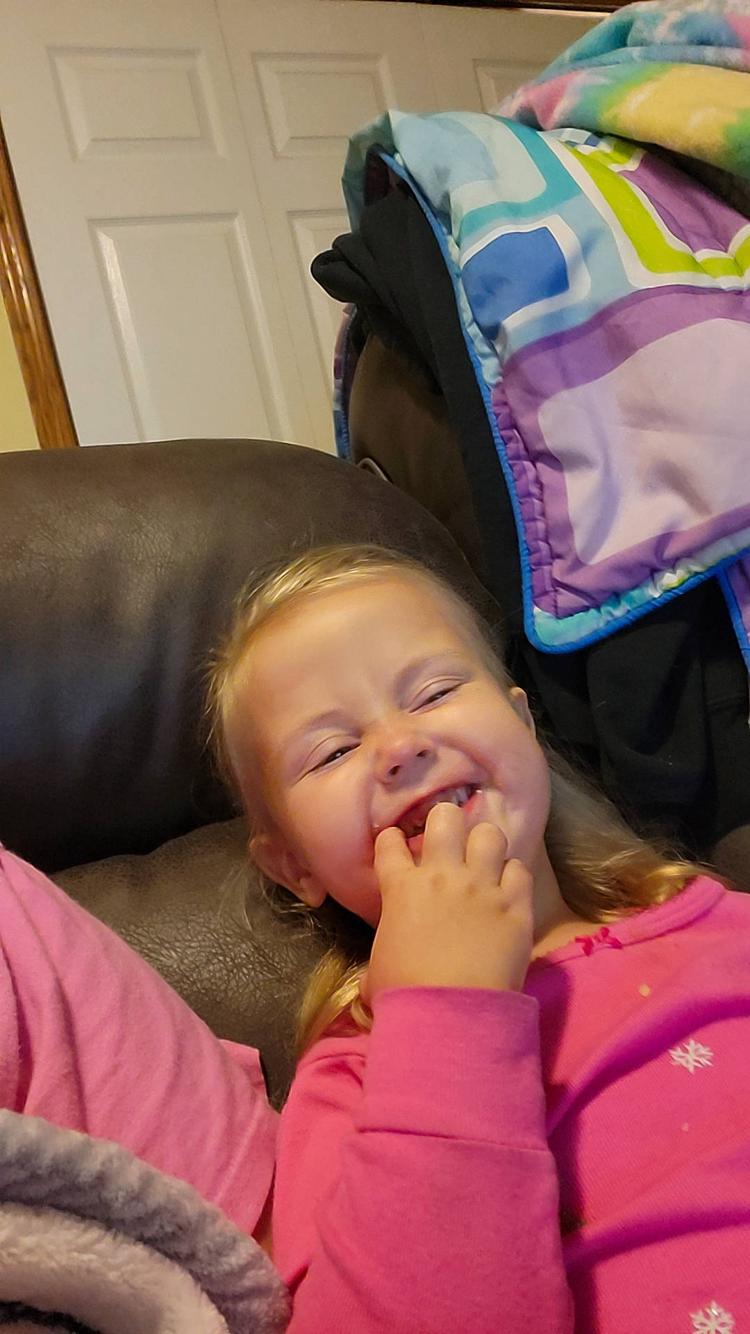 Tessa joined the competition — help win amazing prizes! baby, cheek, child, comfort, couch, door, fun, gesture, happy, laugh, lip, magenta, nail, person, room, sitting, smile, thumb, toddler, tooth