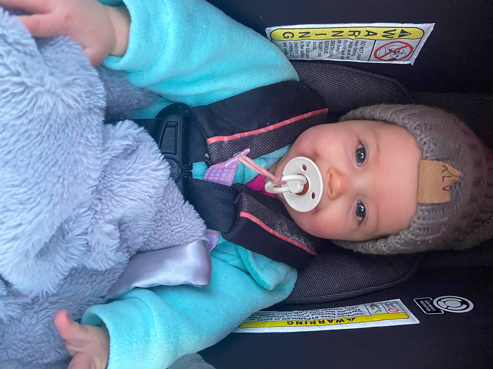 Aria is registered to the contest to win money with this photo: baby, baby_carriage, baby_in_car_seat, baby_products, baby_toddler_clothing, car_seat, cheek, child, comfort, electric_blue, eyelash, finger, headwear, nail, nose, person, sitting, skin, sleeve, thumb