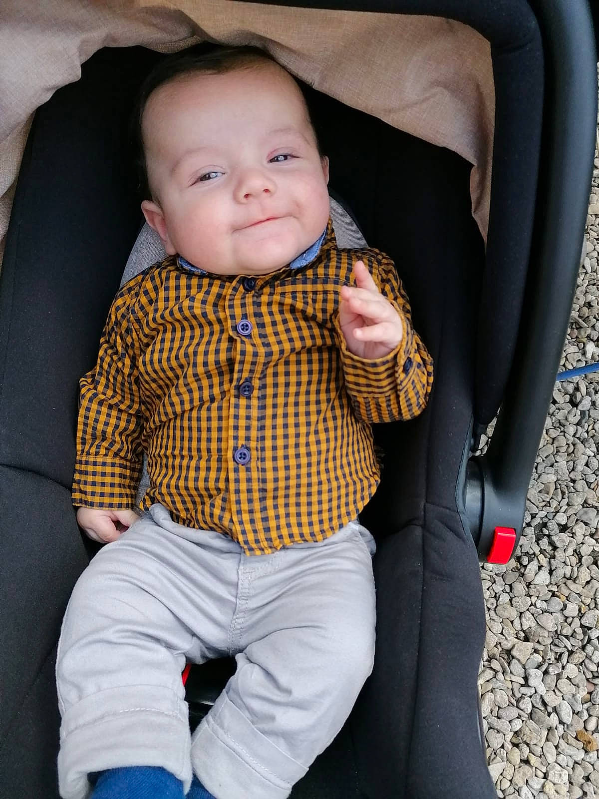 Andrei is registered to the contest to win money with this photo: baby, baby_toddler_clothing, chair, comfort, dress_shirt, finger, gesture, grey, hand, human_body, joint, leg, outerwear, person, product, skin, sleeve, smile, standing, textile