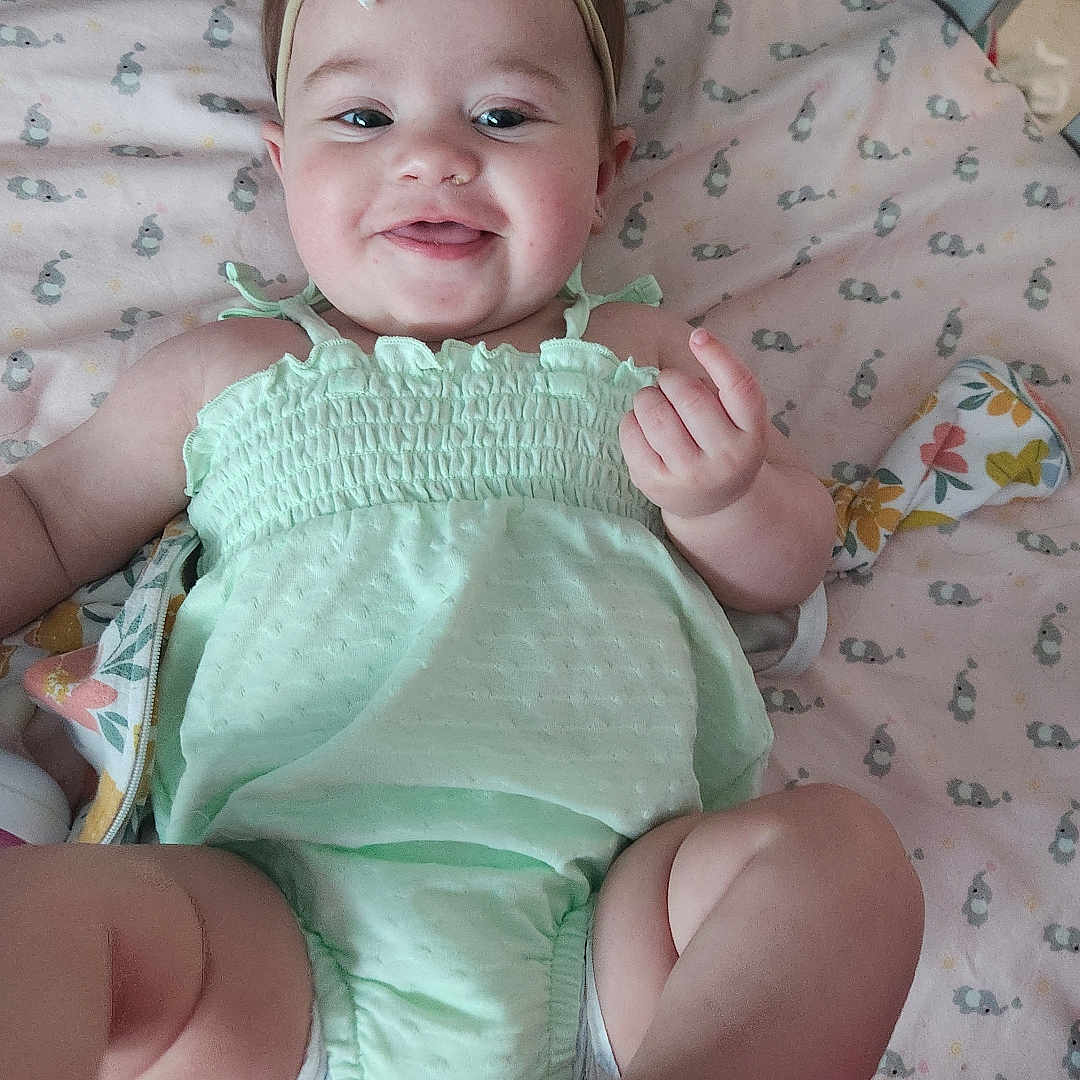 Novaleigh joined the competition — help win amazing prizes! baby, bed, bodypart, clothing, couch, crib, diaper, dress, face, finger, furniture, hand, hat, head, homedecor, infantbed, linen, person, photography, portrait