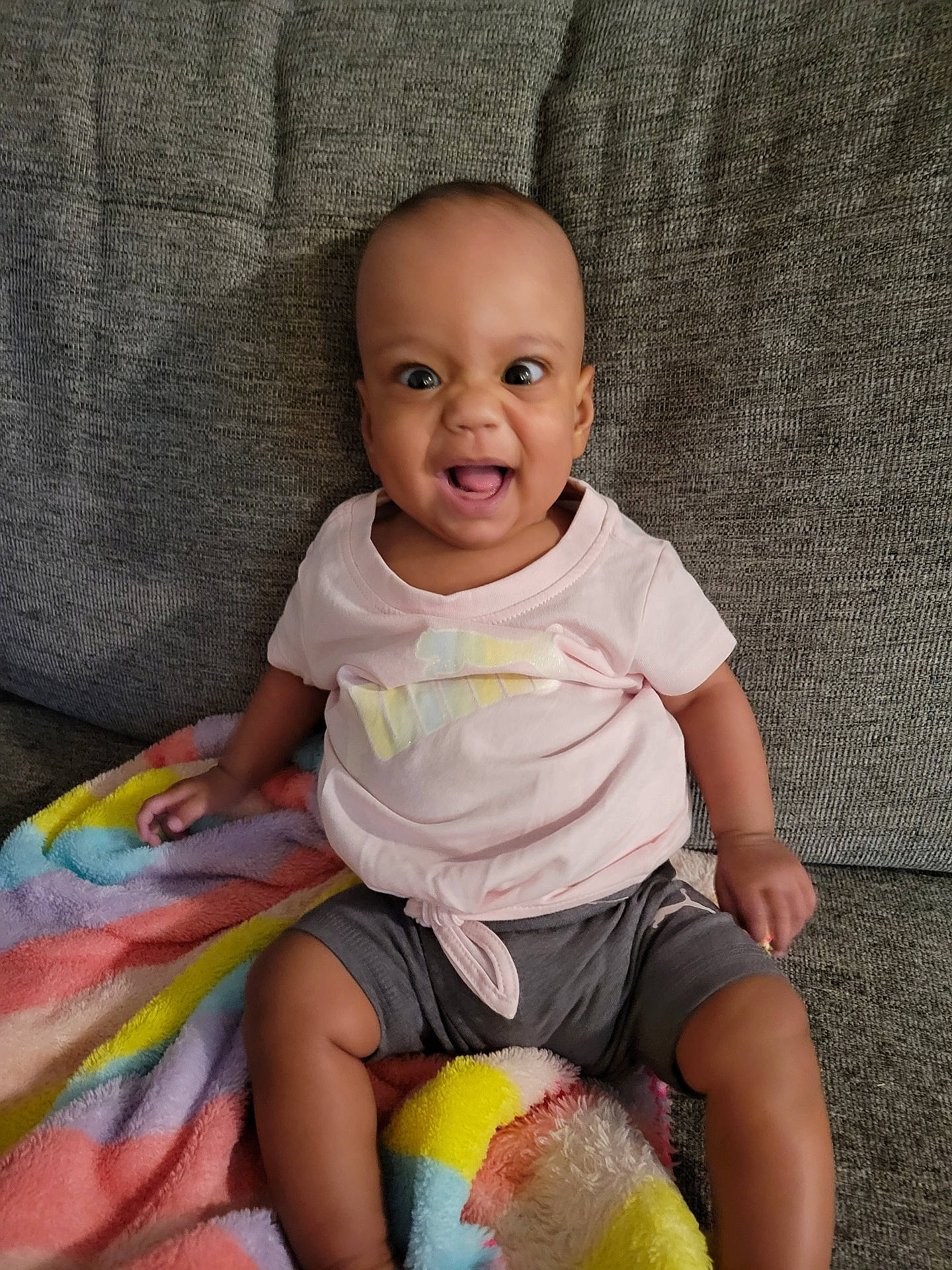 Laylah joined the competition — help win amazing prizes! baby, baby_toddler_clothing, cheek, child, eye, face, facial_expression, fun, happy, head, magenta, people, person, pink, product, shorts, skin, sleeve, smile, t_shirt