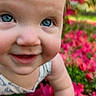 baby, child, blue_eyes, bow, crawling, flowers, pink_flowers, grass, outdoor, nature, happy, cute, face, skin, headwear, smiling, closeup, person, infant, sunlight