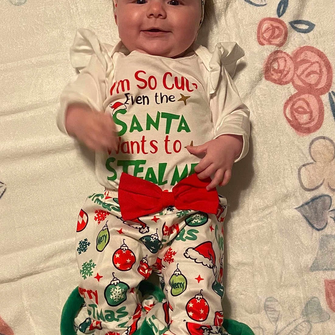 Alice is registered to the contest to win money with this photo: accessories, baby, clothing, dress, face, glove, happy, hat, head, homedecor, jewelry, newborn, pajamas, pants, person, photography, portrait, quilt, smile, t_shirt