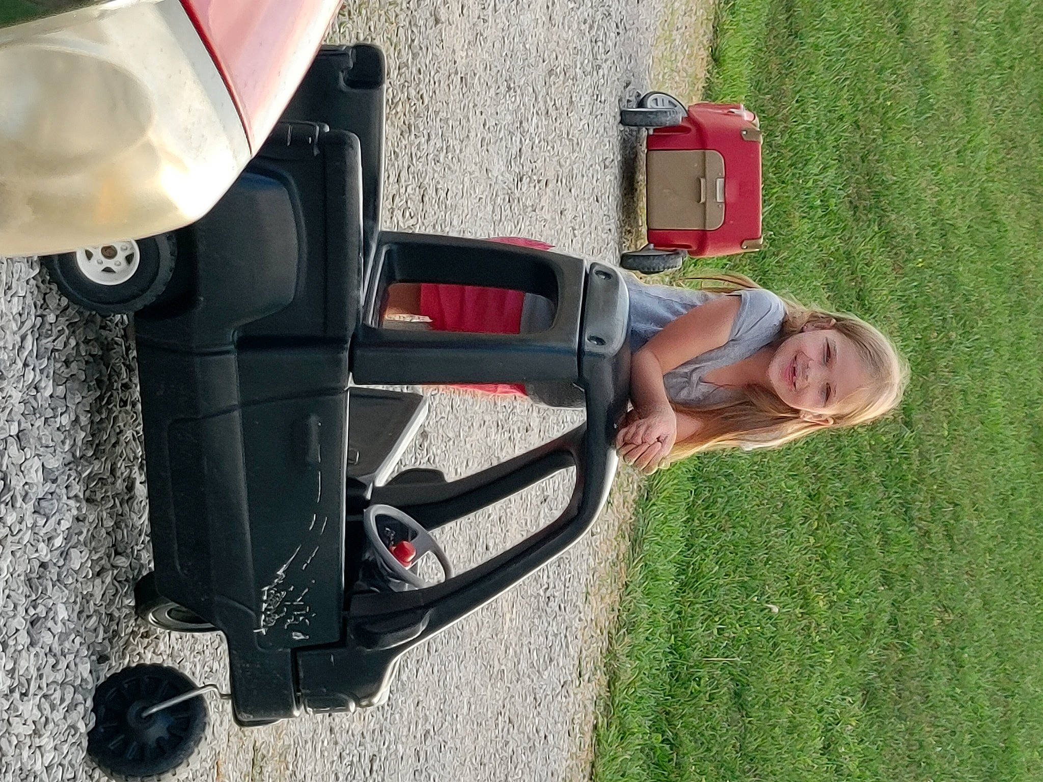 Shayleigh is registered to the contest to win money with this photo: auto_part, automotive_design, automotive_exterior, automotive_lighting, automotive_mirror, automotive_tail_brake_light, automotive_tire, car, family_car, fender, fun, grass, joy, machine, motor_vehicle, person, plant, recreation, tire, vehicle