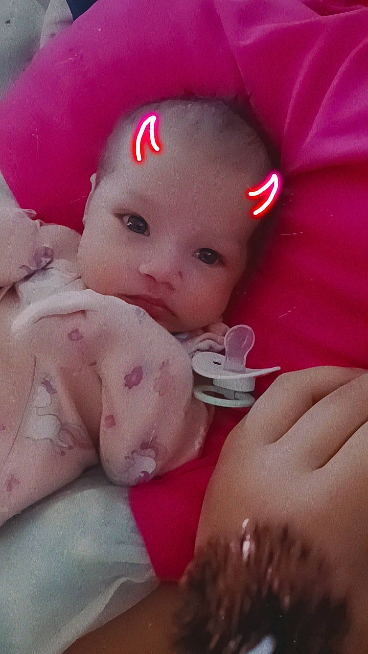 Maggie is registered to the contest to win money with this photo: baby, baby_products, cap, cheek, chest, child, eyebrow, finger, fun, happy, lip, mouth, nail, nose, person, pink, skin, textile, thumb, toddler