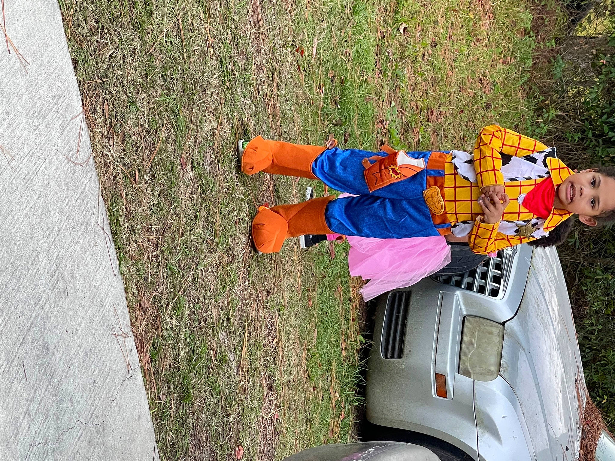 Makih joined the competition — help win amazing prizes! asphalt, automotive_exterior, automotive_lighting, car, electric_blue, family_car, fun, grass, leisure, motor_vehicle, person, plant, recreation, sneakers, tire, toddler, tree, trunk, vehicle, vehicle_door