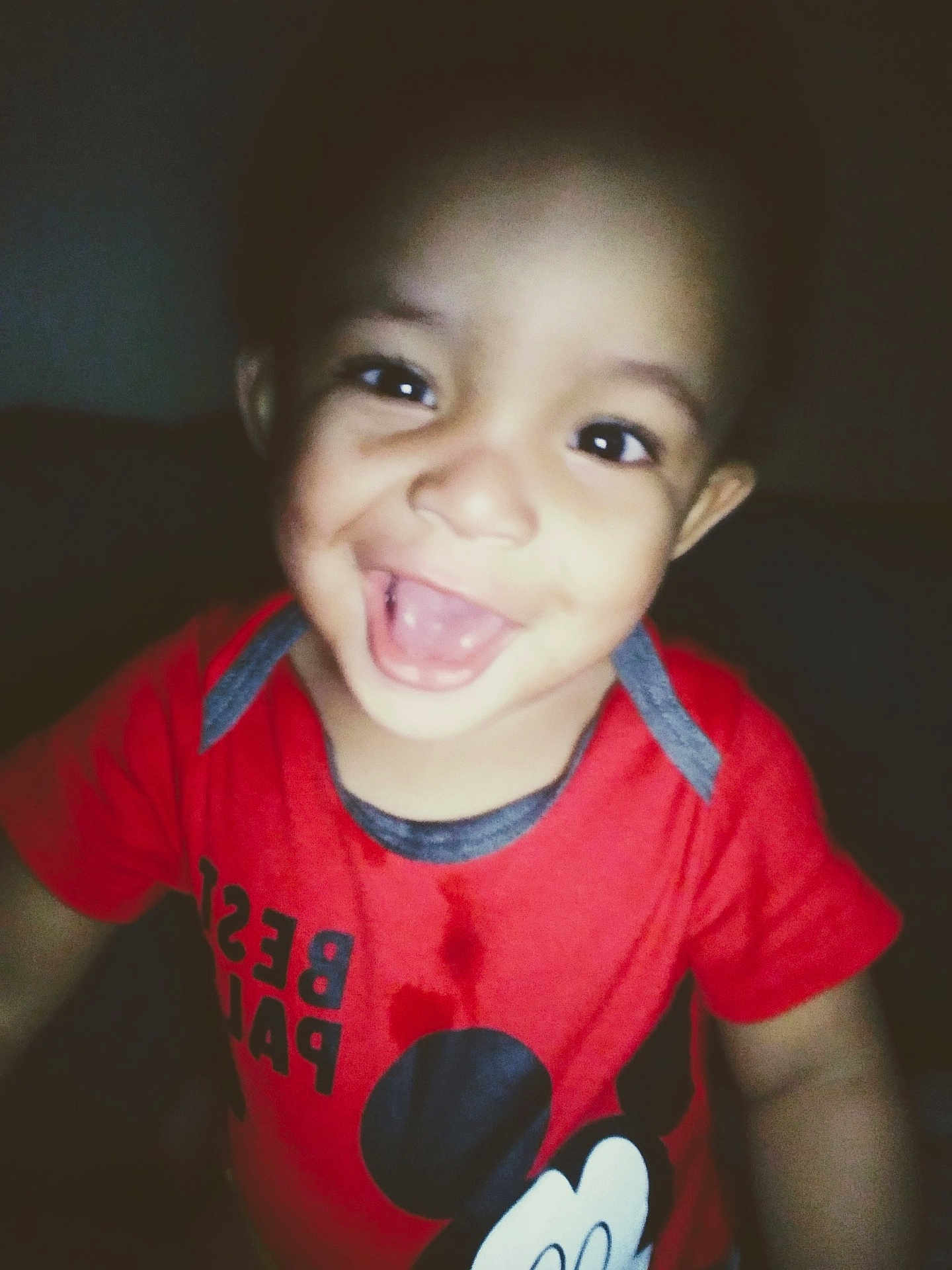 Aquarius joined the competition — help win amazing prizes! toddler, child, smiling, red_shirt, mickey_mouse, face, portrait, happy, indoors, closeup, cute, young_child, person, dark_background, playful, expression, casual_clothing, baby, cheerful, young