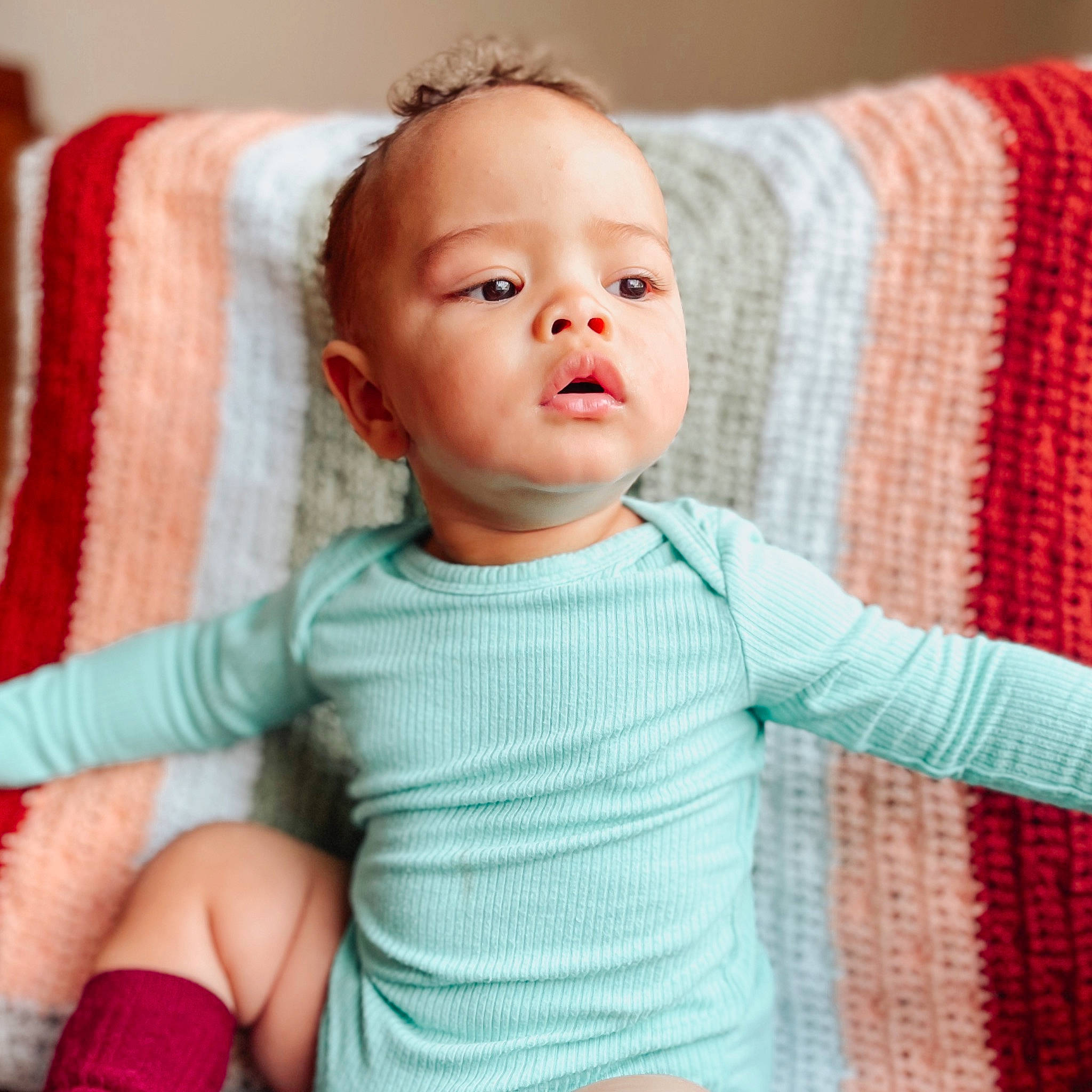 Lucca is registered to the contest to win money with this photo: baby, baby_toddler_clothing, cheek, clothing, comfort, eye, face, facial_expression, head, human_body, iris, lip, neck, nose, person, pink, product, shoulder, skin, sleeve