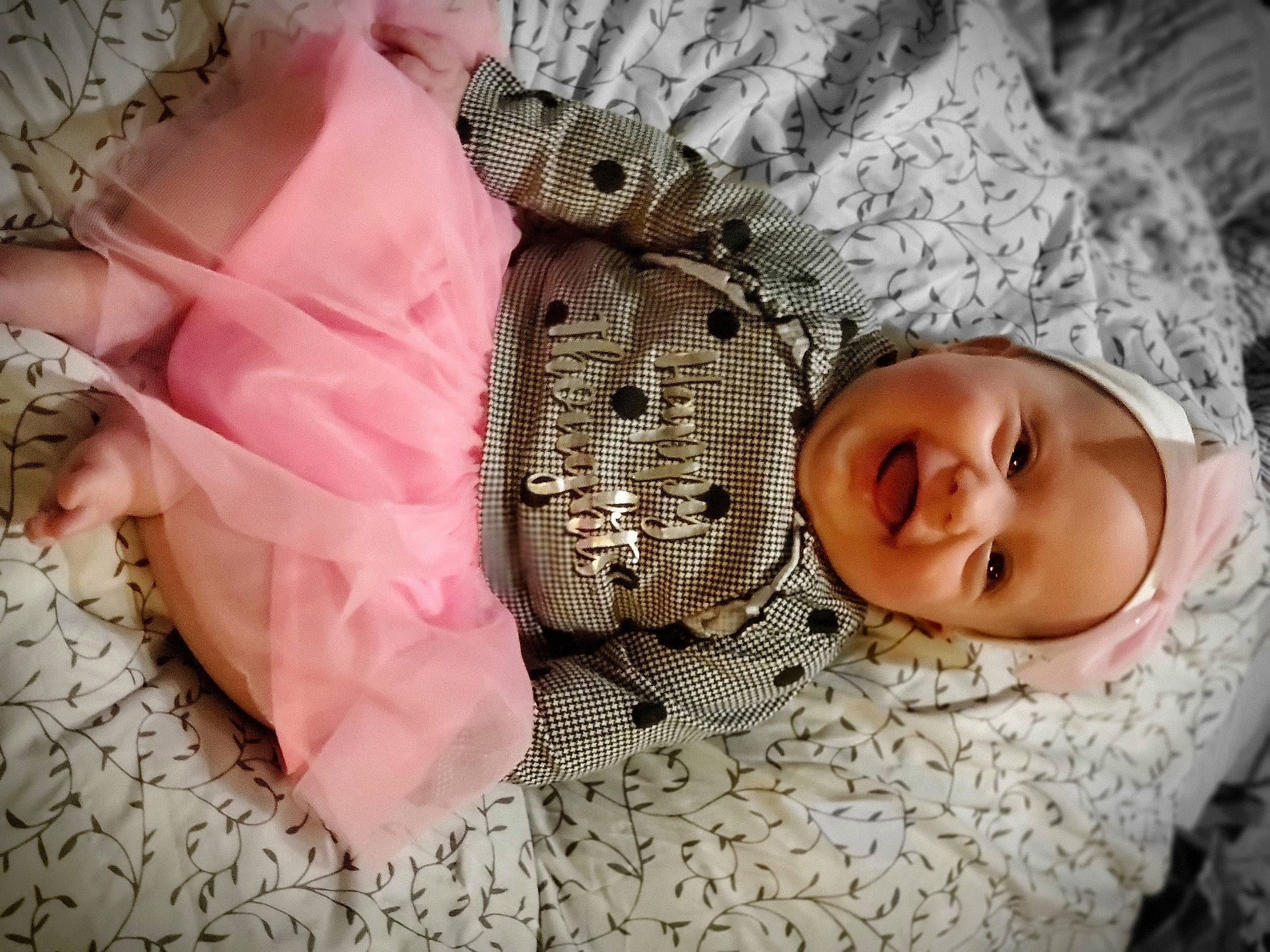 Adelina is registered to the contest to win money with this photo: arm, baby, baby_products, baby_sleeping, baby_toddler_clothing, comfort, fashion_accessory, fur, hand, happy, headwear, linens, pattern, person, pink, skin, sleeve, smile, textile, toddler