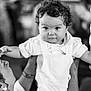 Nael a rejoint le concours — aidez-le/la à gagner de superbes lots ! baby, child, curly_hair, black_and_white, person, adult, portrait, smile, happy, holding, face, eyes, hands, clothing, interaction, indoor, people, close_up, love, family