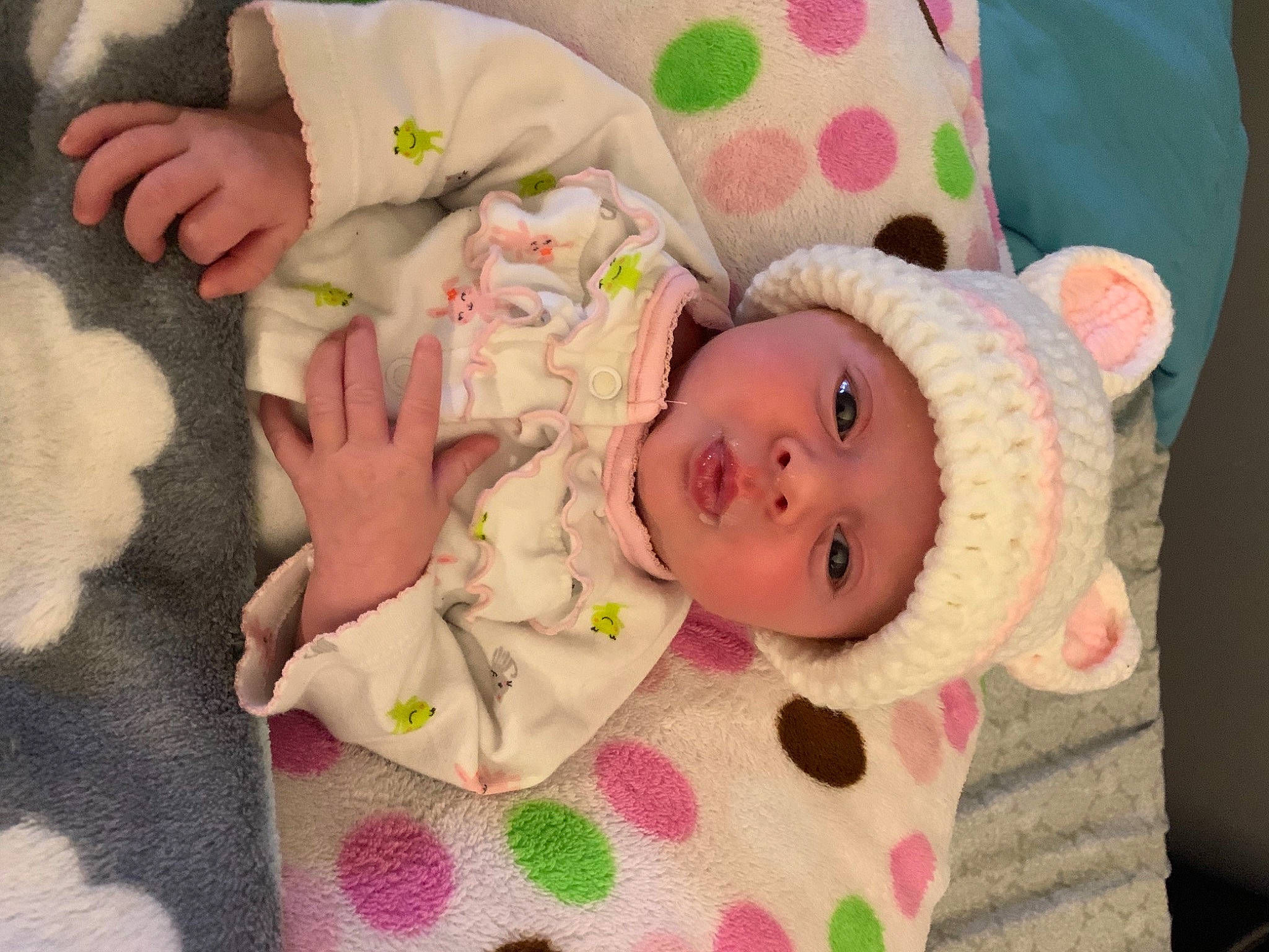 Emma joined the competition — help win amazing prizes! baby, baby_products, baby_safety, baby_toddler_clothing, bedtime, cheek, child, comfort, eye, face, head, headwear, iris, linens, pattern, person, pink, product, room, skin