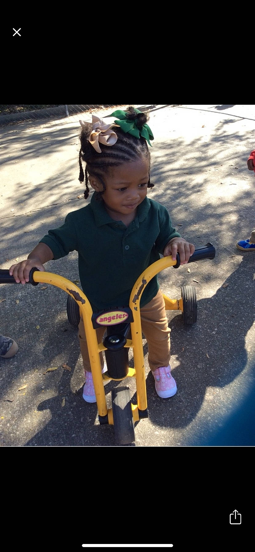 Malani joined the competition — help win amazing prizes! asphalt, baby, baby_products, child, city, fun, grass, happy, leisure, person, play, recreation, riding_toy, road, sitting, smile, tire, toddler, toy, tricycle