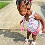 toddler, child, girl, braided_hair, pink_bow, plush_toy, flamingo, shorts, sandals, outdoor, sunny, side_view, shadow, concrete, happy, playing, summer_clothing, person, cute, motion