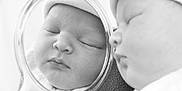 Yanis a rejoint le concours — aidez-le/la à gagner de superbes lots ! baby, sleeping, reflection, mirror, hat, closeup, face, infant, peaceful, monochrome, black_and_white, portrait, newborn, soft_texture, cute, child, calm, closed_eyes, resting, adorable
