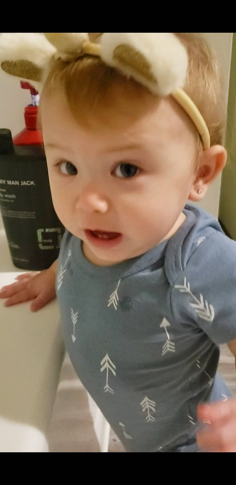 Amina is registered to the contest to win money with this photo: baby, baby_toddler_clothing, blond, cheek, child, ear, eyebrow, eyelash, forehead, hair, happy, iris, lip, neck, nose, person, skin, sleeve, standing, surprise