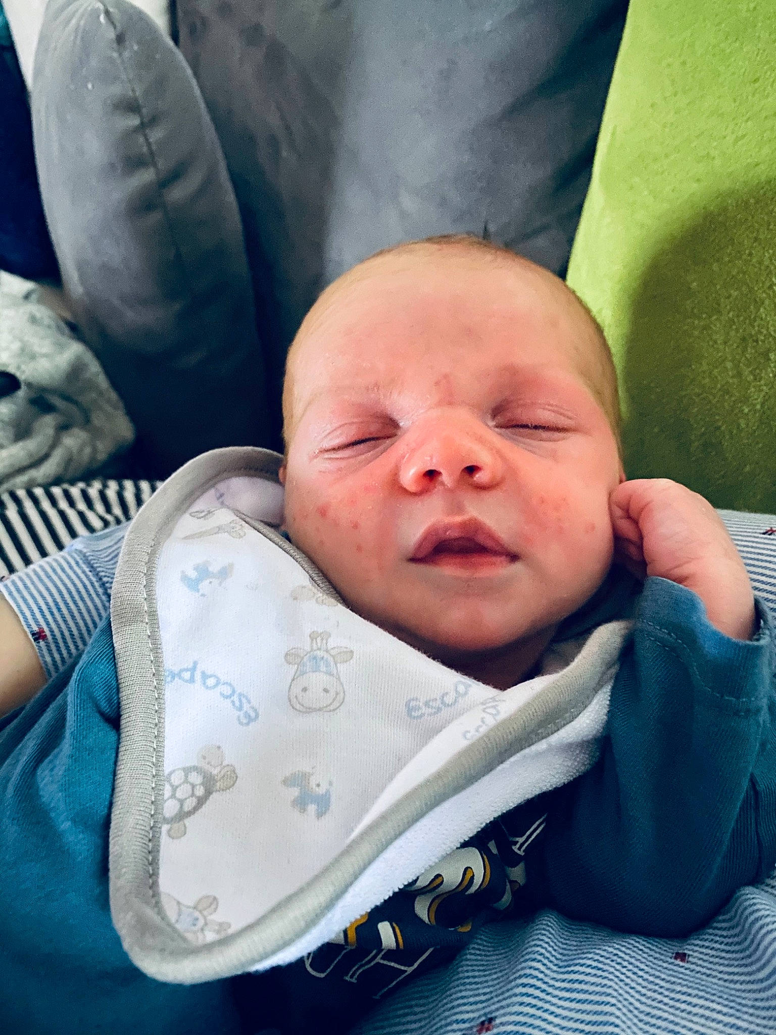 Antonin participe au concours pour gagner de l'argent avec cette photo : baby, baby_products, baby_toddler_clothing, cheek, child, comfort, couch, gesture, head, linens, mammal, mouth, nose, person, room, sitting, skin, textile, thumb, toddler