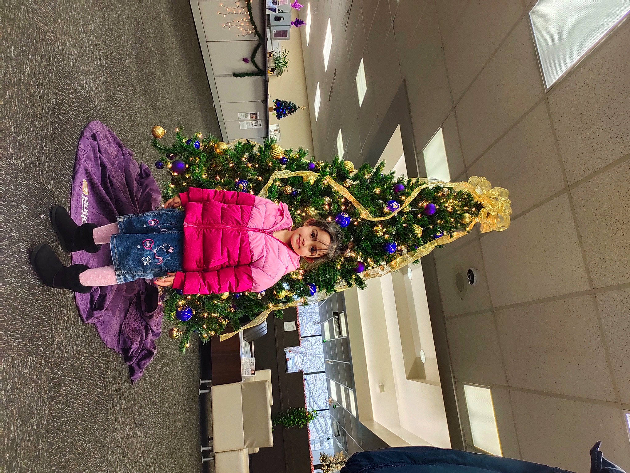Jessica is registered to the contest to win money with this photo: building, costume, event, facade, floral_design, floristry, flower, flower_arranging, houseplant, joy, magenta, person, plant, purple, street, tree, window