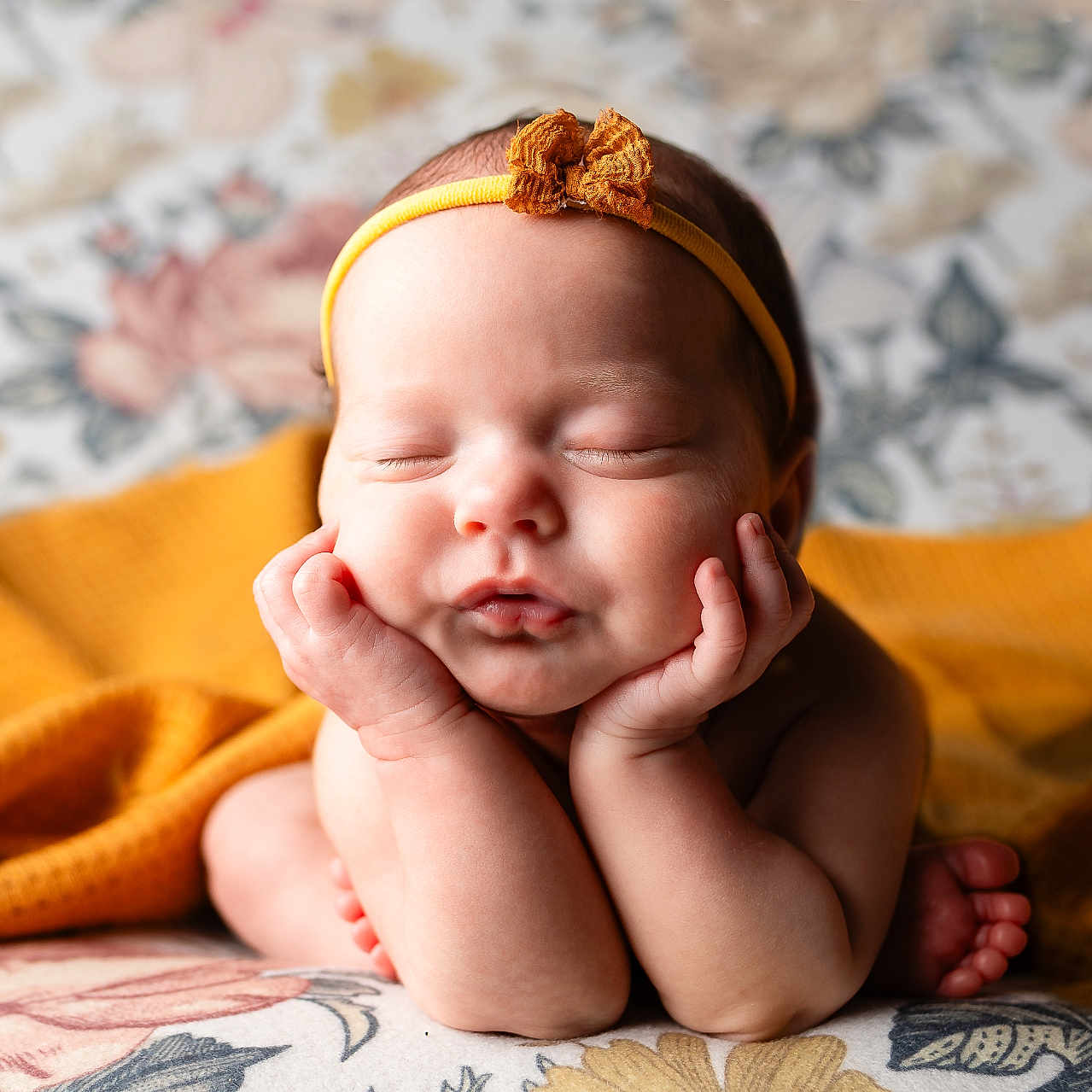 Lily is registered to the contest to win money with this photo: baby, blanket, bodypart, bonnet, clothing, crying, face, finger, hand, happy, head, newborn, person, photography, portrait, quilt, sad, sleeping, smile, towel