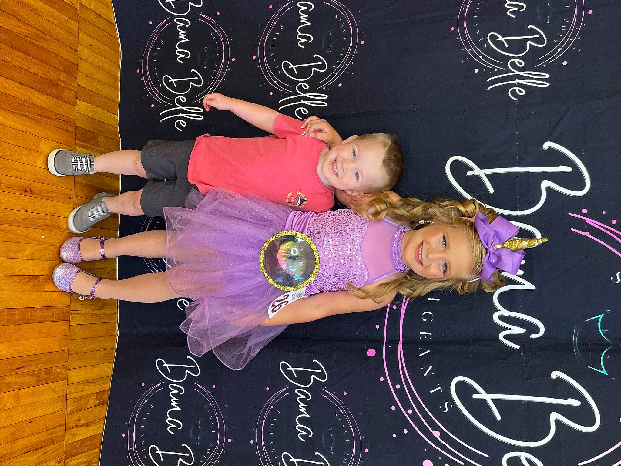 Gavin is registered to the contest to win money with this photo: art, blackboard, chalk, child, event, font, fun, graphic_design, graphics, happy, hardwood, joy, magenta, pattern, person, purple, smile, thigh, violet, visual_arts